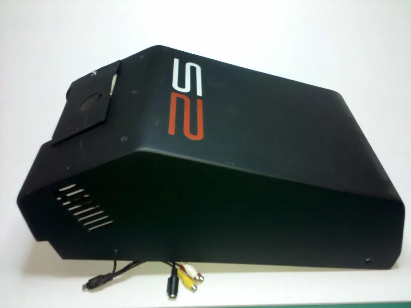 A black box with red and orange lettering on it.