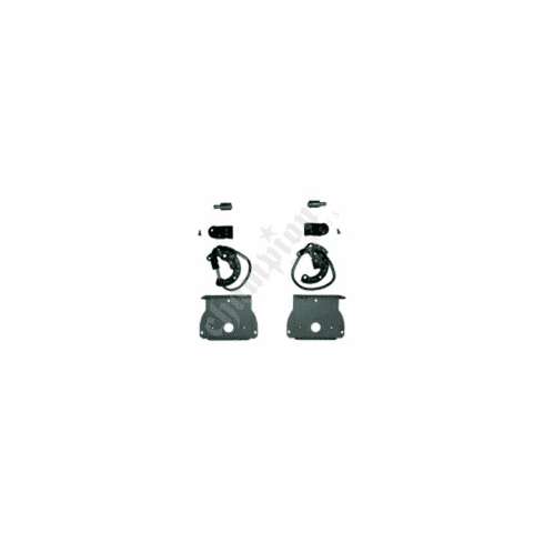 A pair of black and white earrings sitting on top of a table.