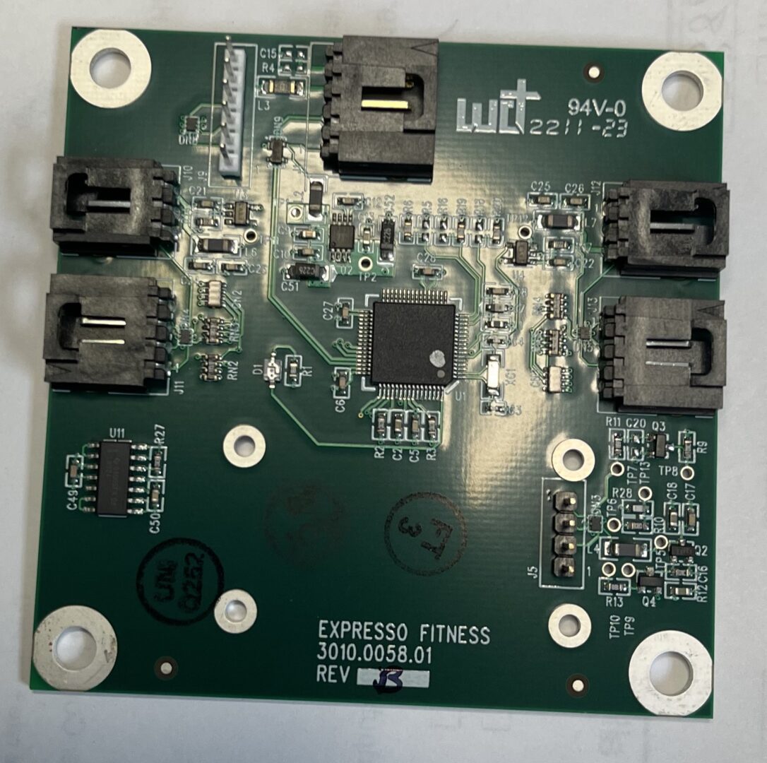 Circuit board with various electronic components.