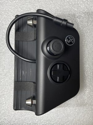 Black controller module with joystick and D-pad